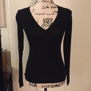 Long sleeve black sweater.  The Limited XS